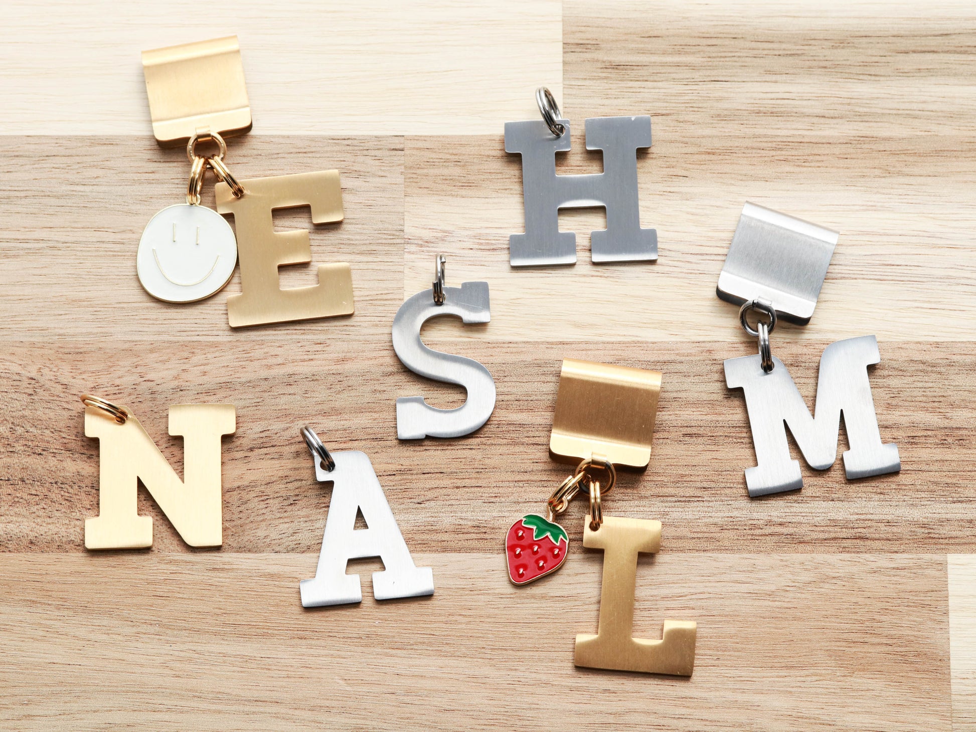Block letter charms in gold and silver from Lucky Tags.