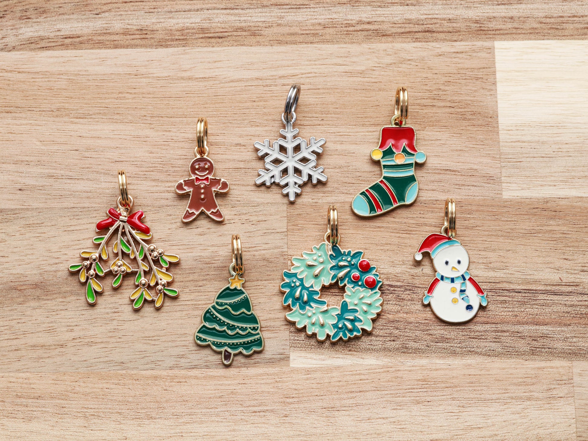 Snowflake collar charm, gingerbread collar charm, mistletoe collar charm, Christmas tree collar charm, wreath collar charm, snowman collar charm, Christmas stocking collar charm.