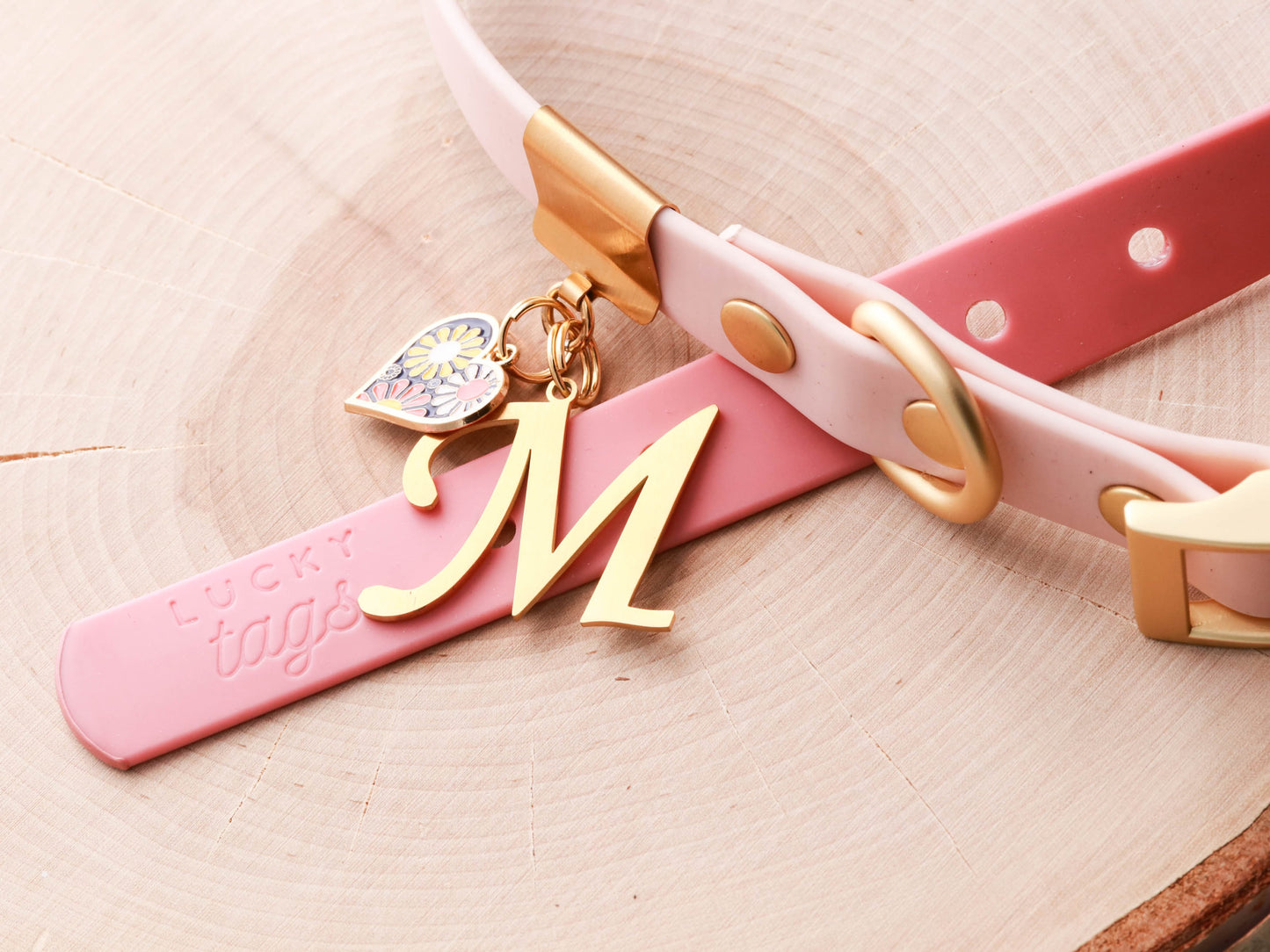 Pink Lucky Tags weatherproof collar with cursive letter collar charm.